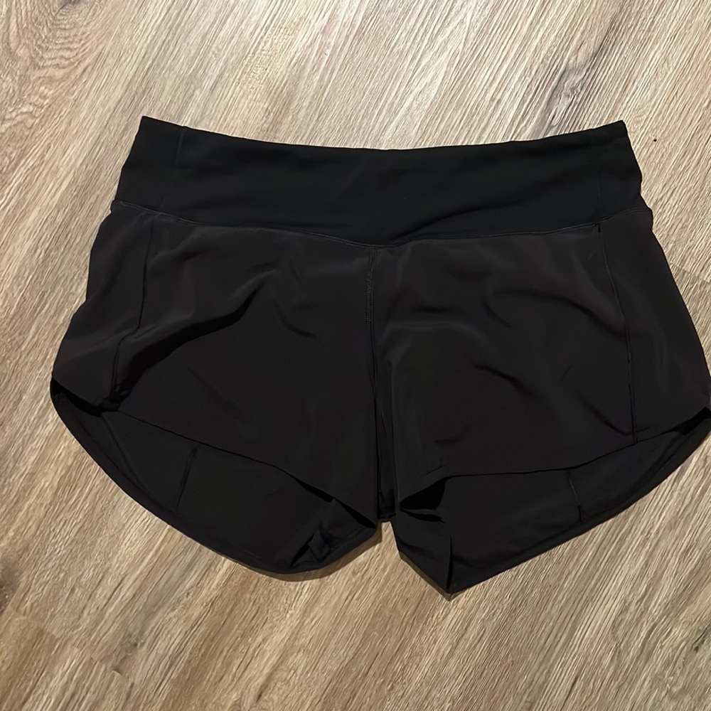 Black lululemon hotty hots shorts size 8